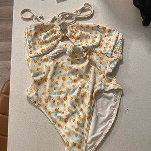One piece swimsuit from dippin daisies, Clementine is the name of it